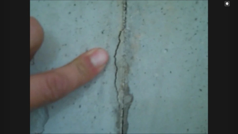 Foundation crack before repair in a Cherry Hill, NJ basement