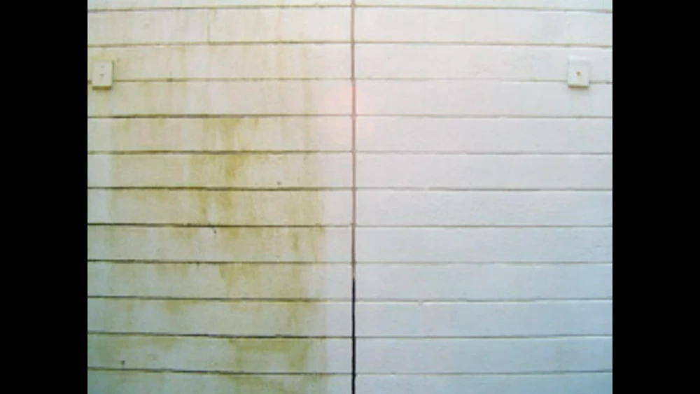 Before and after photos of a wall with water staining and mold removed